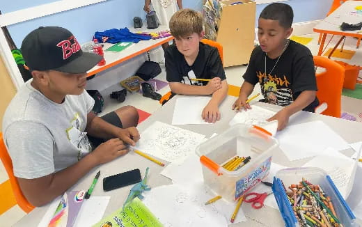a group of boys painting
