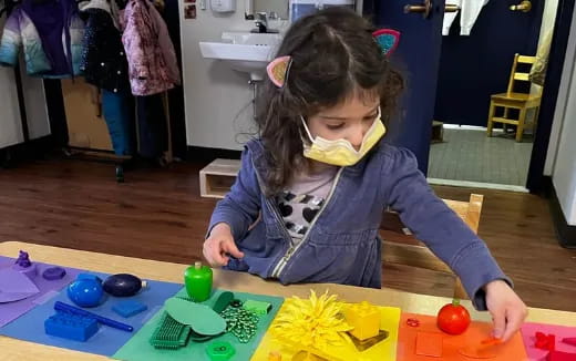 a young girl painting