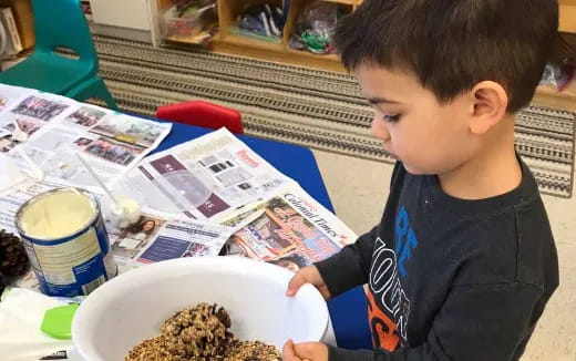 a boy eating cereal