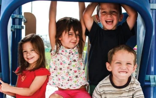 a group of children smiling