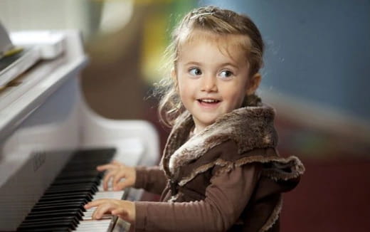 a child playing a piano