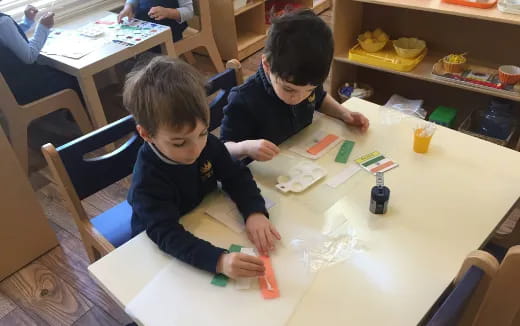 a couple of boys playing with toys