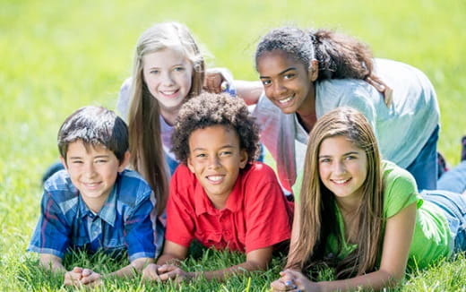 a group of children smiling