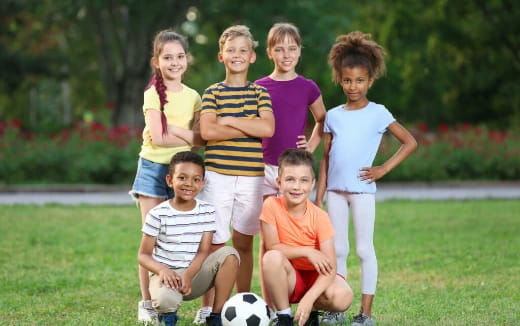 a group of kids posing for a picture