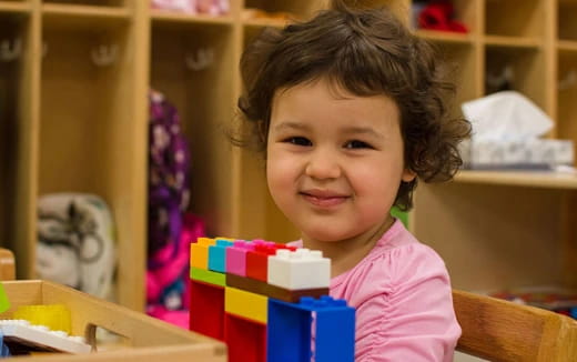 a child smiling for the camera