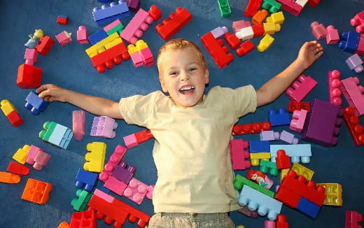 a baby playing with toys
