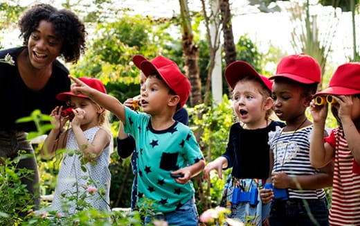a group of people in a garden