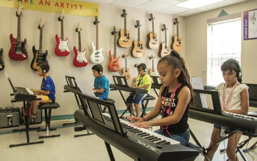 a group of people playing instruments