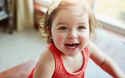 a little girl with blonde hair