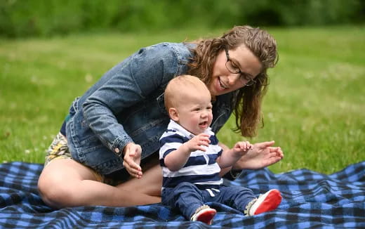 a person holding a baby