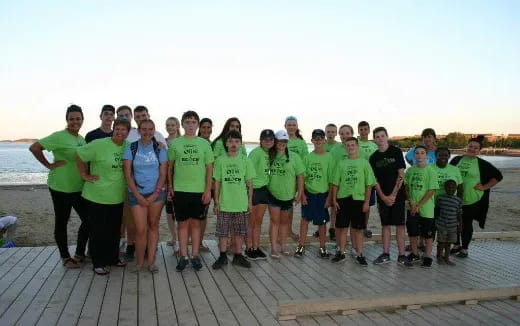 a group of people posing for a photo