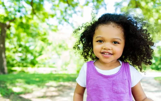 a child with curly hair