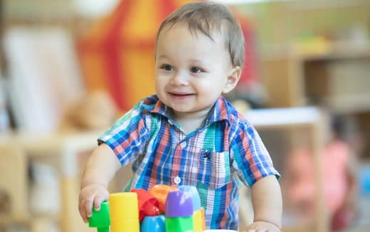 a child holding a toy