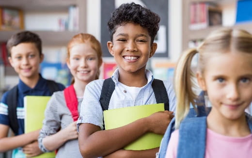a group of children smiling