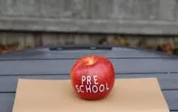 a red apple on a table