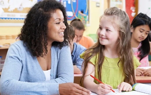 a teacher helping a student