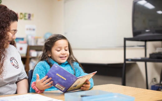 a girl reading a book