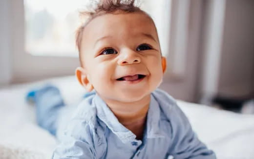 a baby with a smile