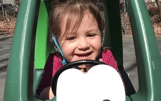 a child in a stroller