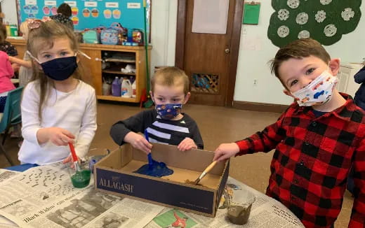 a group of children with paint on their faces
