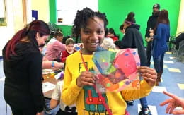 a person holding a kite