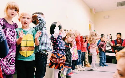 a group of children in a classroom