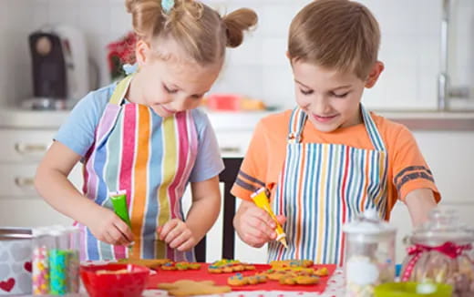 a couple of kids making food