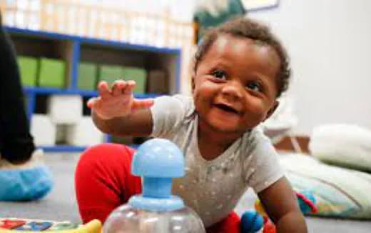 a baby with a bottle