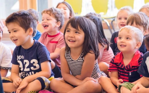 a group of children sitting together