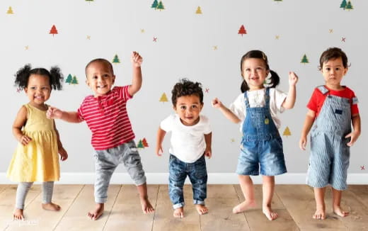 a group of children dancing