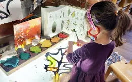 a young girl painting