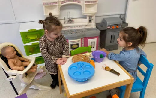 a few children playing with toys
