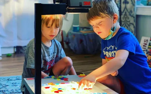 a couple of kids playing with toys