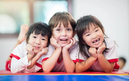 a group of kids smiling