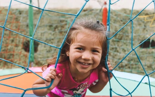 a girl in a swing