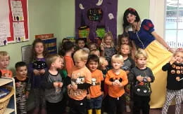 a group of children in a classroom