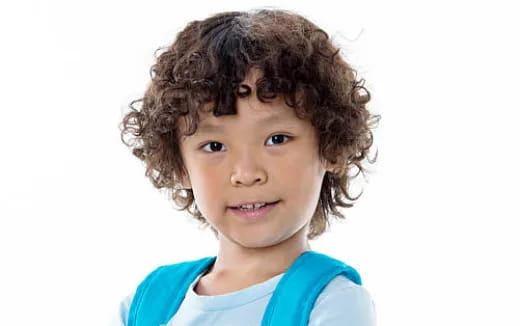 a child with curly hair