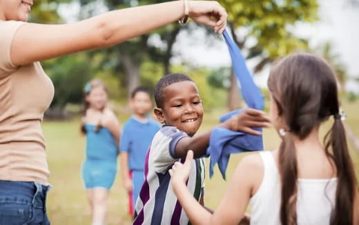a group of people holding hands