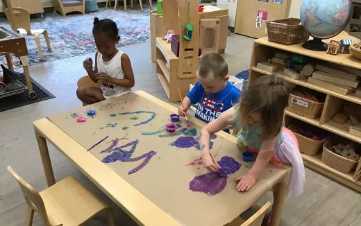 children sitting at a table