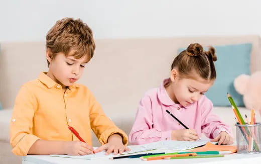 a few children studying together