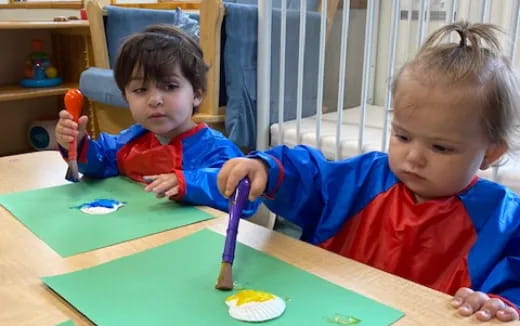 a couple of kids playing with toys