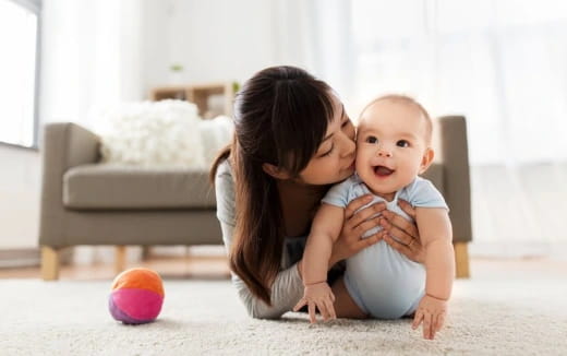 a person holding a baby