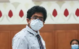 a man wearing a mask