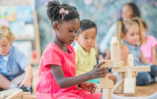 medium shot of kids sitting next to each other