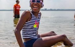 a person sitting on a beach