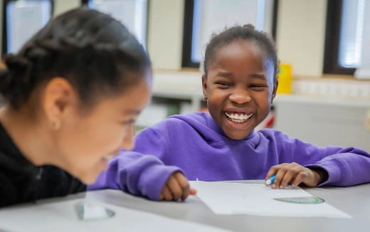a person and a child smiling