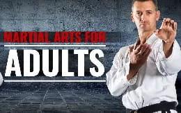 a man with his hands up