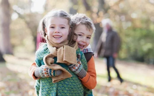 a couple of children hugging