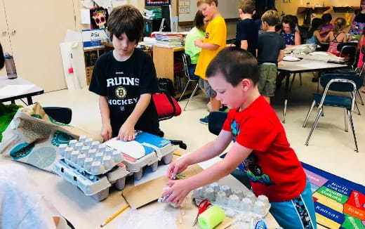 a group of children playing with toys