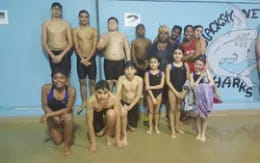 a group of people posing for a photo